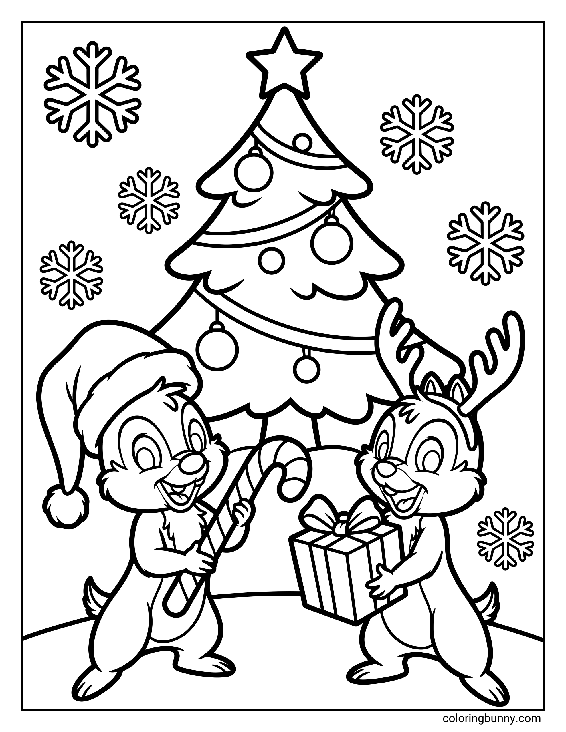A Chip 'n' Dale Disney Christmas coloring page of cheerful Chip and Dale chipmunks standing in front of a decorated Christmas tree with ornaments and a star on top. One chipmunk wears a Santa hat and holds a candy cane, while the other has reindeer antlers and carries a wrapped present, surrounded by falling snowflakes.
