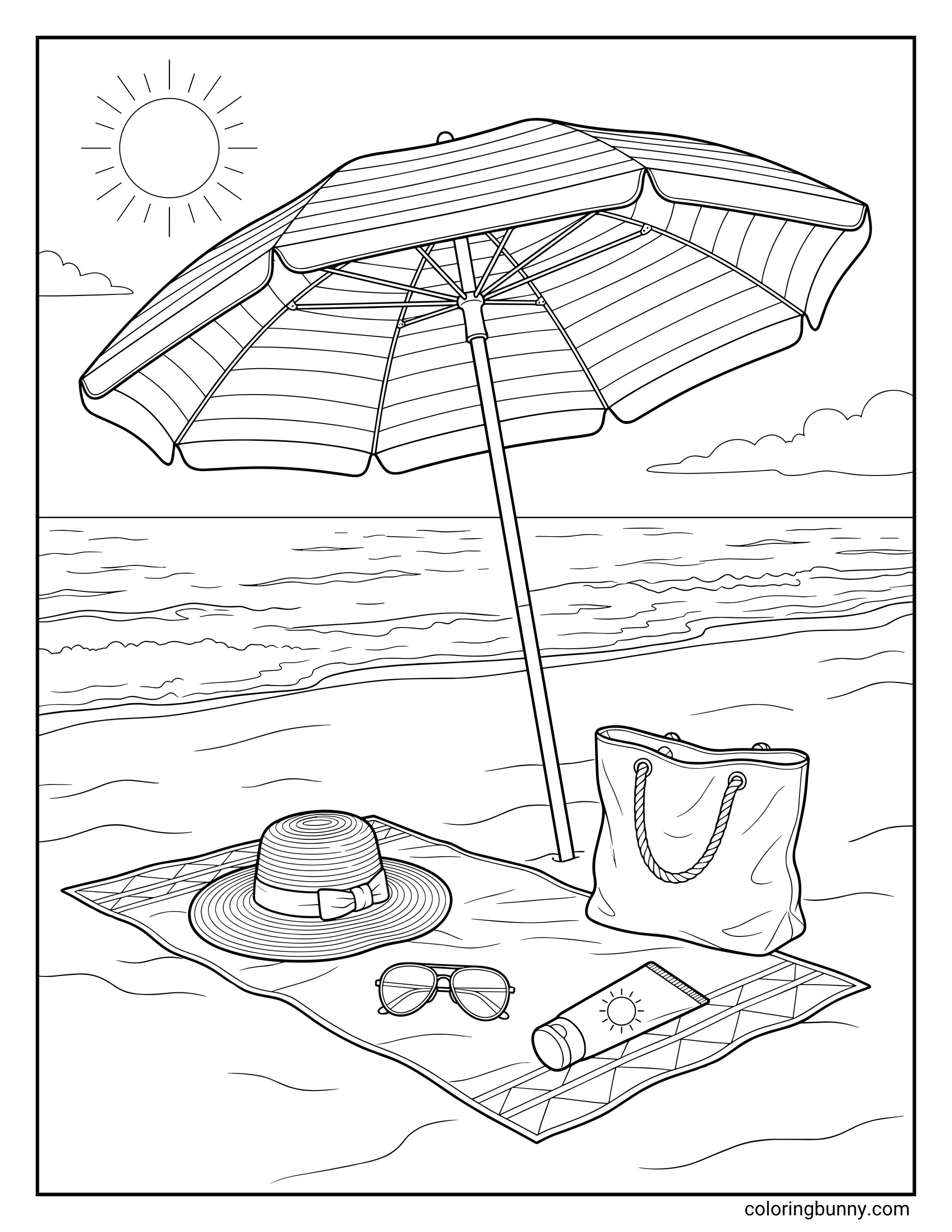 Printable beach coloring sheet showing a relaxing seaside setup with a big umbrella planted in the sand, a towel laid out below, a wide-brim hat, sunglasses, sunscreen, and a tote bag. Ocean waves roll in behind the scene, with the sun and clouds in the sky.